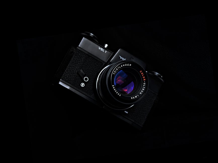 A modern photography studio with lighting equipment and a camera setup